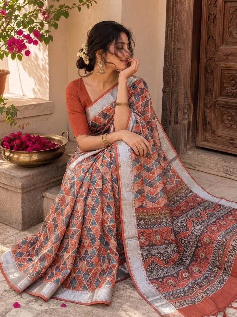 Rust printed saree with blouse piece