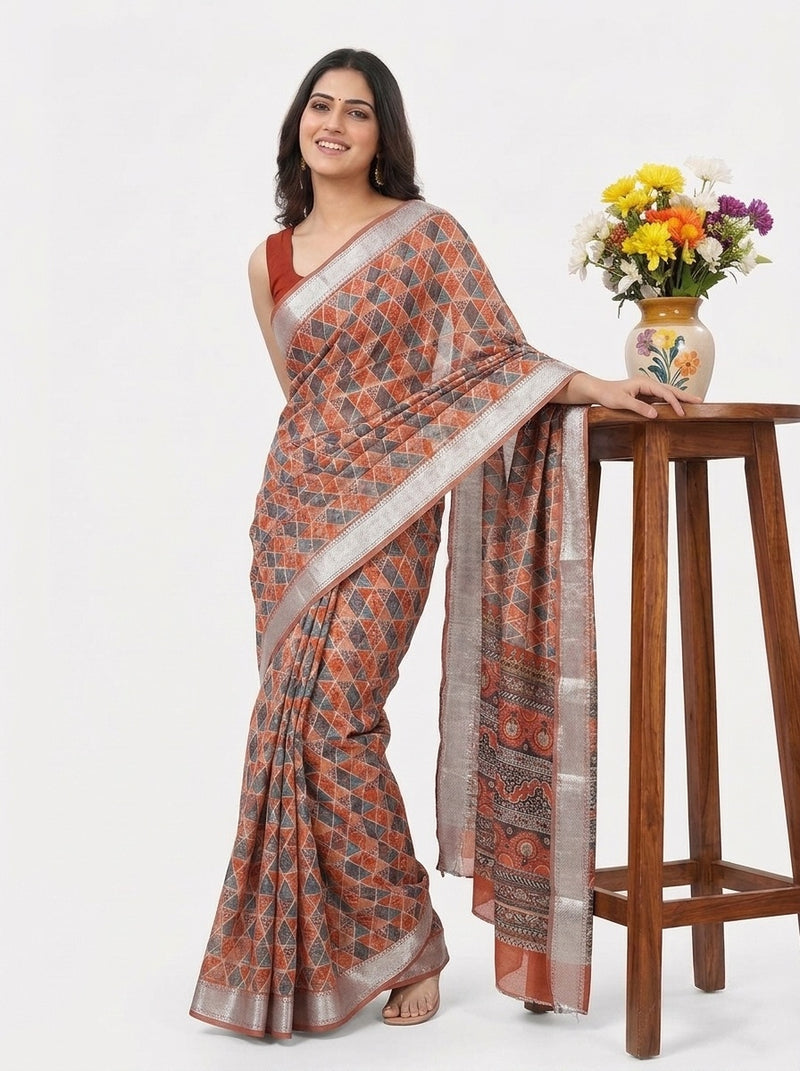Rust printed saree with blouse piece