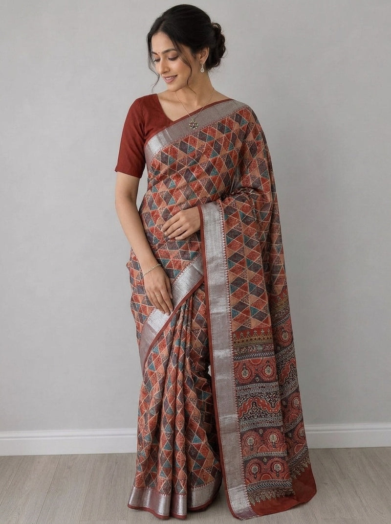 Rust printed saree with blouse piece
