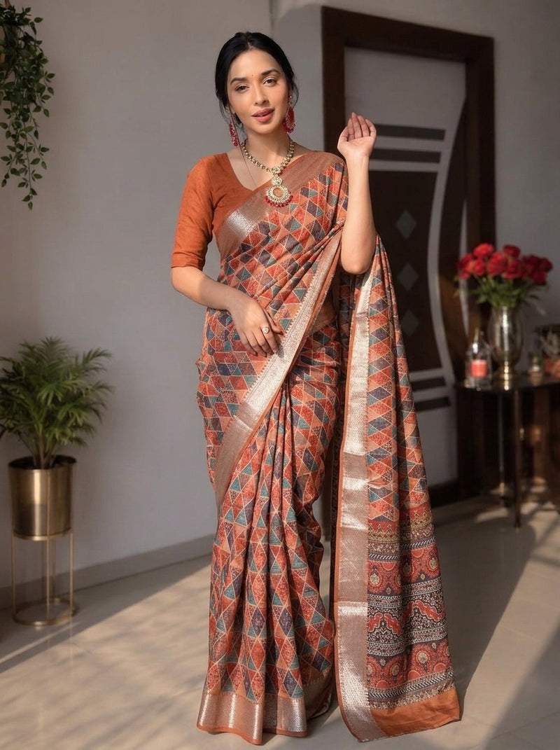 Rust printed saree with blouse piece