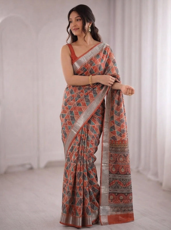 Rust printed saree with blouse piece