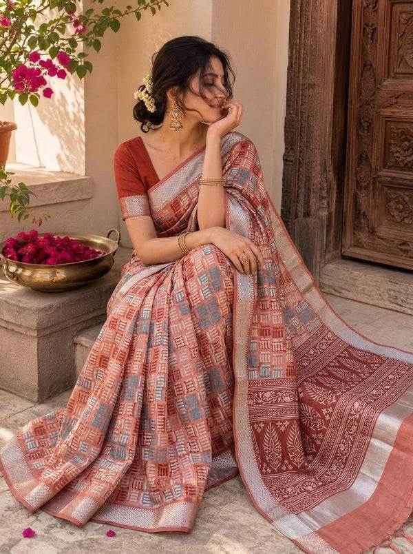 Rust printed saree with blouse piece