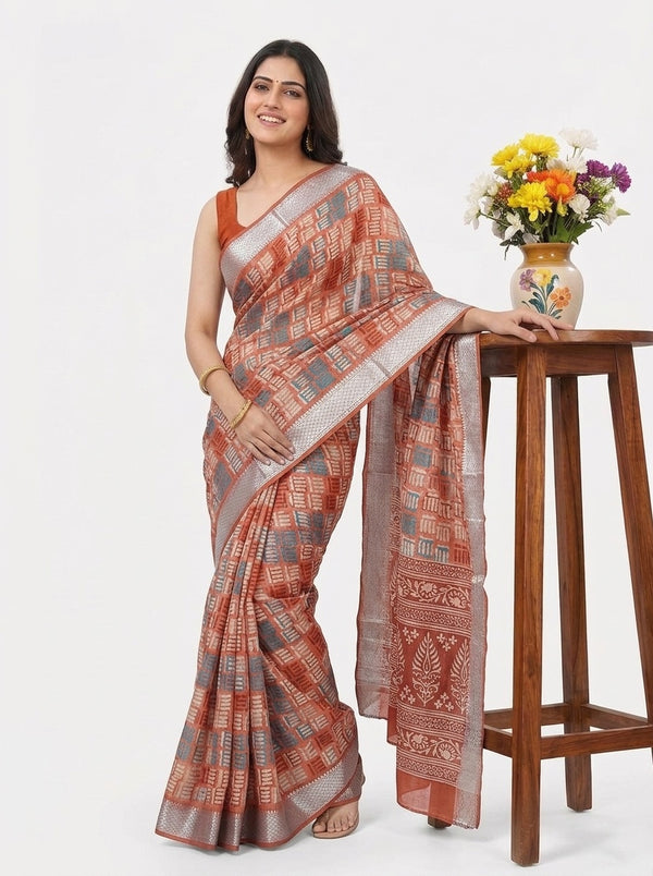 Rust printed saree with blouse piece
