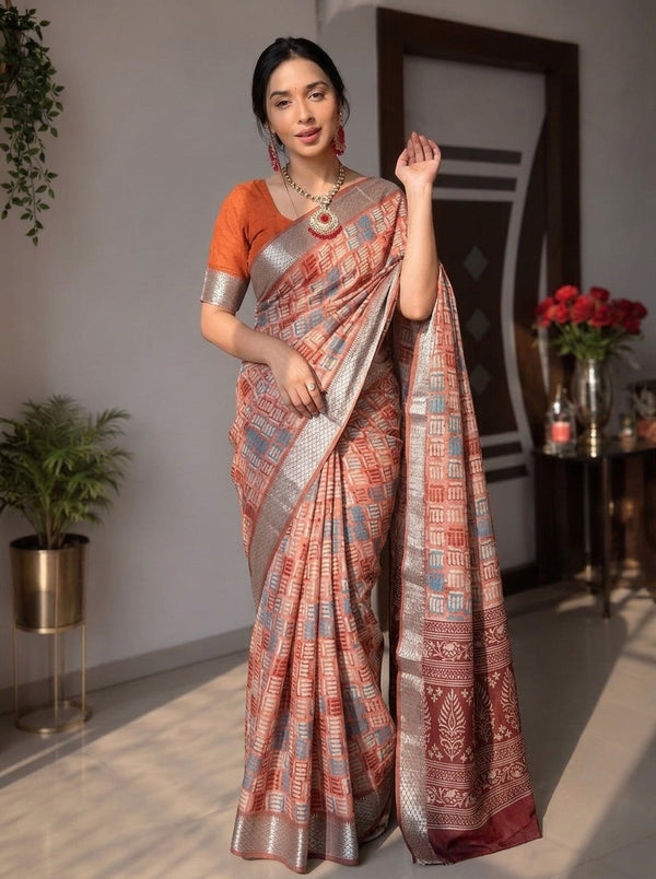 Rust printed saree with blouse piece