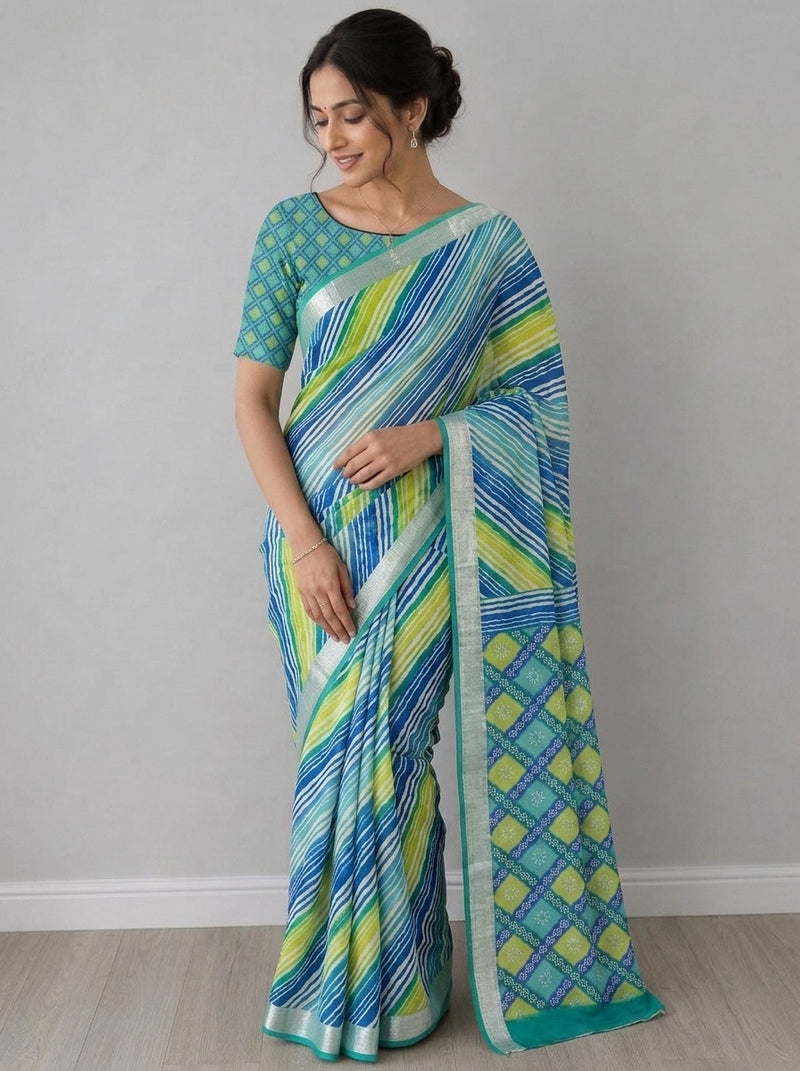 Teal printed saree with blouse piece