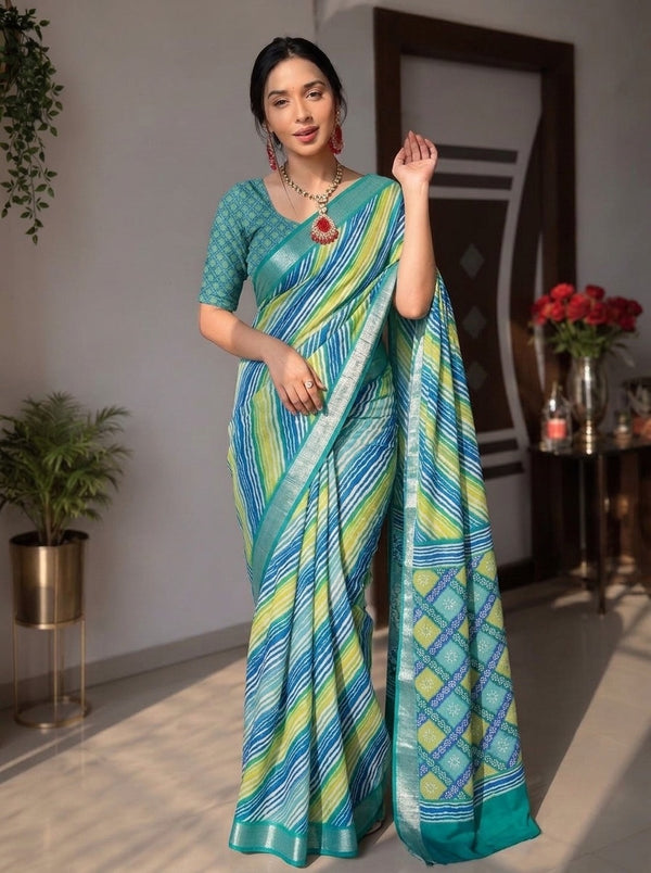 Teal printed saree with blouse piece