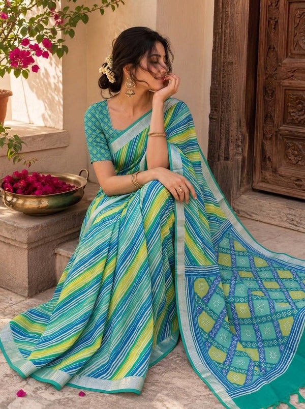 Teal printed saree with blouse piece